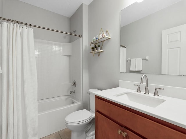 full bathroom with shower / tub combo with curtain, vanity, tile patterned floors, and toilet