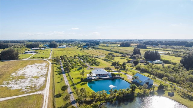 aerial view featuring a rural view and a water view