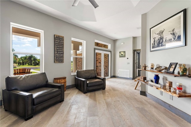 living room with light hardwood / wood-style flooring