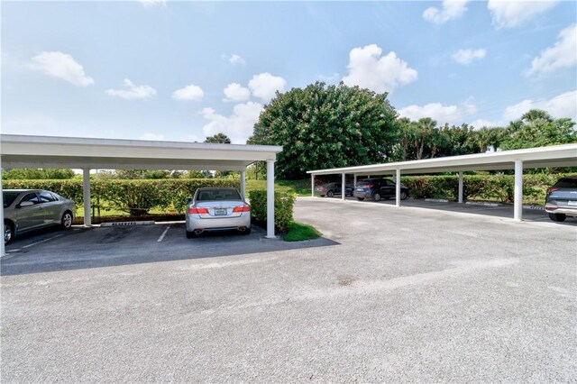 217 Grove Isle Cir Unit 217, Vero Beach, FL 32962 - view of covered parking lot