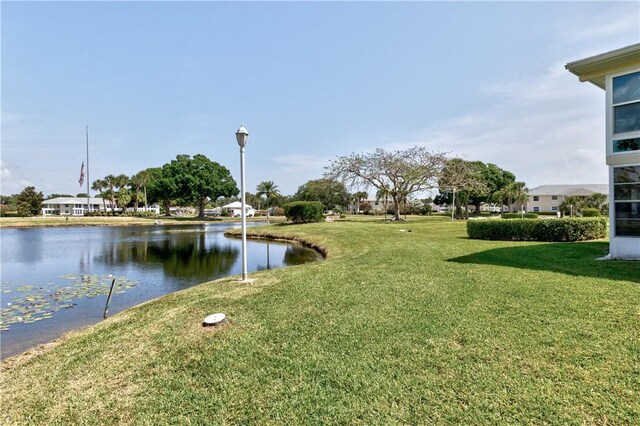 217 Grove Isle Cir Unit 217, Vero Beach, FL 32962 - view of yard featuring a water view