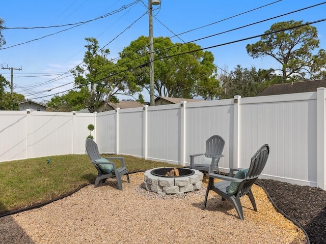 view of yard featuring a fire pit