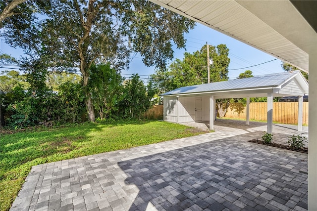 view of patio featuring a carport