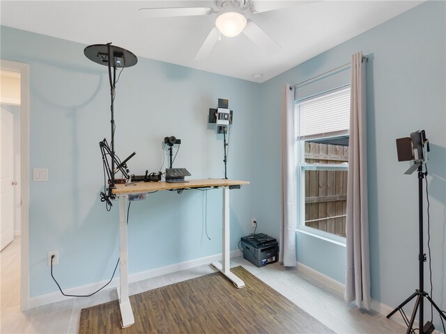 interior space featuring light hardwood / wood-style floors and ceiling fan