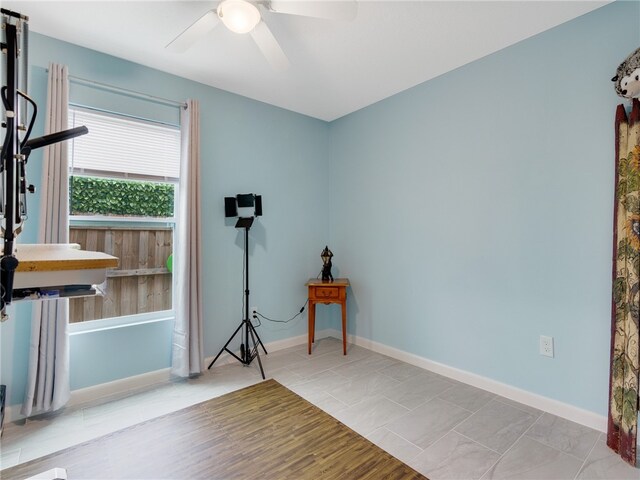 interior space featuring ceiling fan