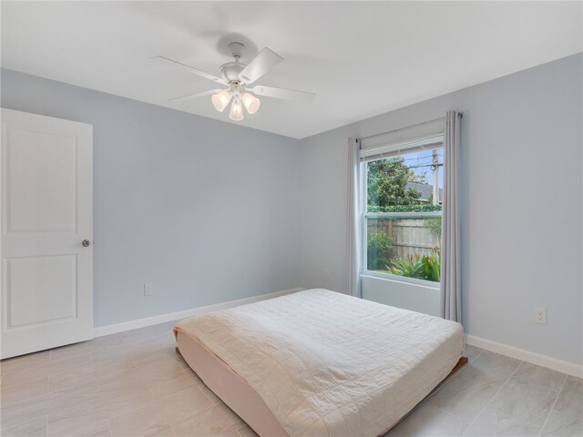 bedroom featuring ceiling fan