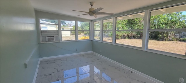 unfurnished sunroom featuring lofted ceiling, cooling unit, a healthy amount of sunlight, and ceiling fan