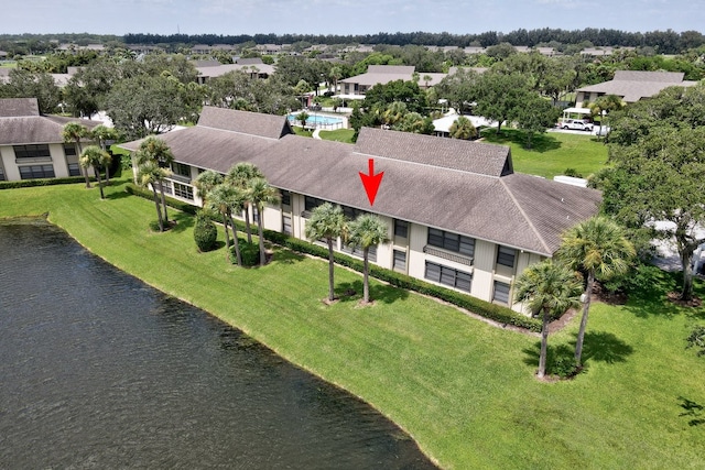 birds eye view of property featuring a water view