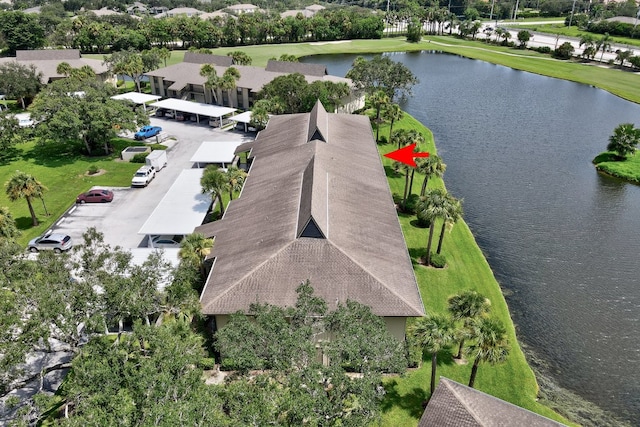 bird's eye view with a water view