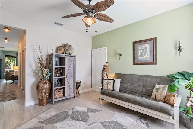 10095 W Villa Cir, Vero Beach, FL 32966 - sitting room featuring ceiling fan, visible vents, baseboards, and light wood-style flooring