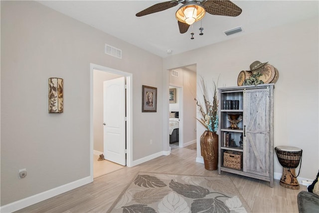 10095 W Villa Cir, Vero Beach, FL 32966 - interior space with visible vents, light wood-style floors, and baseboards