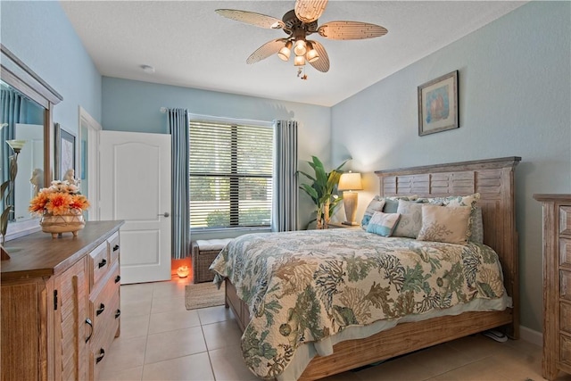 10095 W Villa Cir, Vero Beach, FL 32966 - bedroom featuring light tile patterned floors and ceiling fan