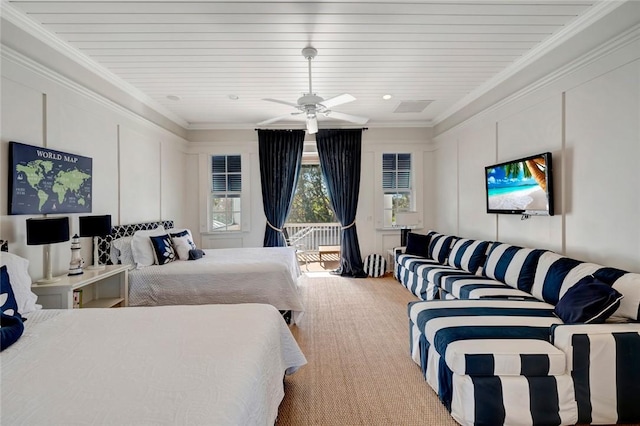 bedroom with wood ceiling, ceiling fan, ornamental molding, and light colored carpet