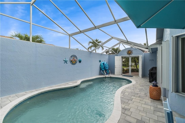 223 River Walk Unit 12, Hutchinson Island, FL 34949 - outdoor pool with a patio, a lanai, and grilling area