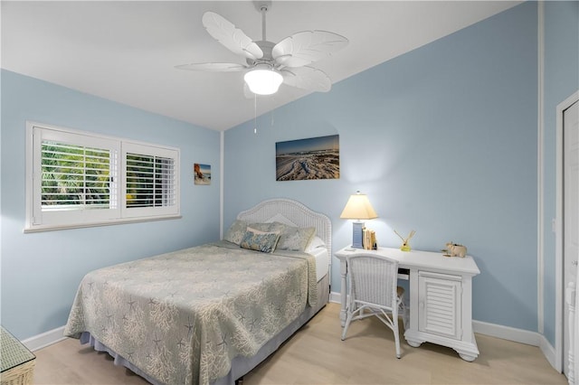 223 River Walk Unit 12, Hutchinson Island, FL 34949 - bedroom featuring wood finished floors and a ceiling fan