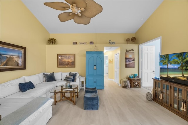 223 River Walk Unit 12, Hutchinson Island, FL 34949 - living area featuring a ceiling fan, light wood-type flooring, and lofted ceiling