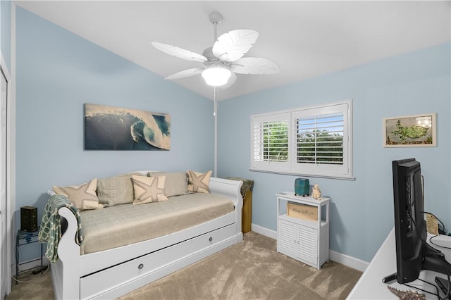 223 River Walk Unit 12, Hutchinson Island, FL 34949 - carpeted bedroom featuring baseboards and ceiling fan