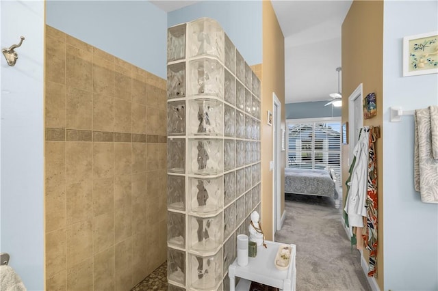 223 River Walk Unit 12, Hutchinson Island, FL 34949 - ensuite bathroom with a walk in shower and ceiling fan