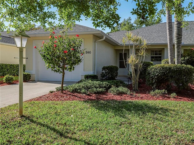 946 S Easy St, Sebastian, FL 32958 - single story home with a garage, a front yard, stucco siding, and a shingled roof