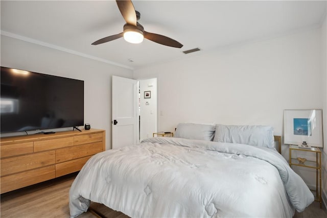 1933 Robalo Dr, Vero Beach, FL 32960 - bedroom featuring wood finished floors and ceiling fan