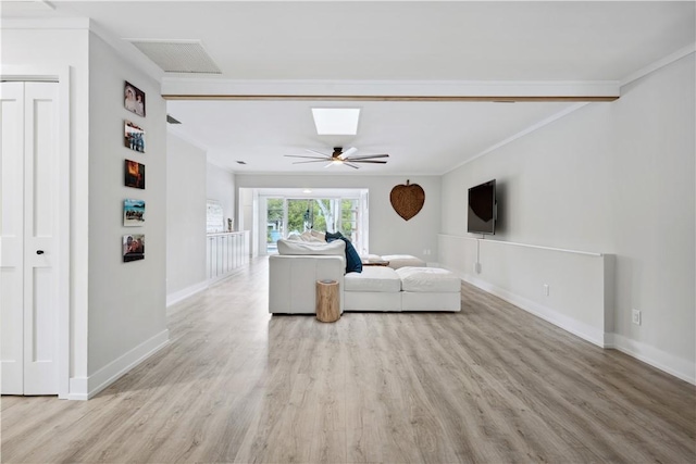 1933 Robalo Dr, Vero Beach, FL 32960 - living area featuring wood finished floors and ornamental molding