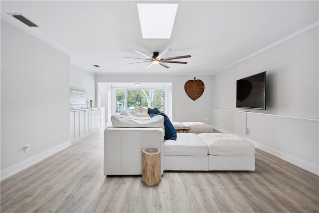 1933 Robalo Dr, Vero Beach, FL 32960 - living room featuring light wood-type flooring and a ceiling fan