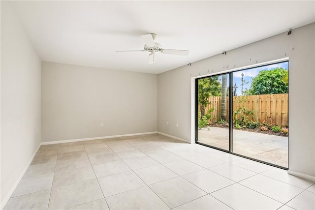 415 E Waverly Pl Unit 1C, Vero Beach, FL 32960 - empty room with baseboards, ceiling fan, and light tile patterned floors