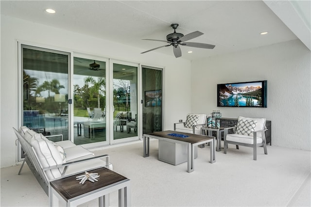 living room with ceiling fan