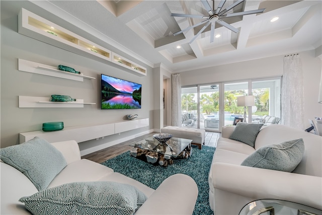 living room featuring beam ceiling, ceiling fan, hardwood / wood-style floors, and coffered ceiling