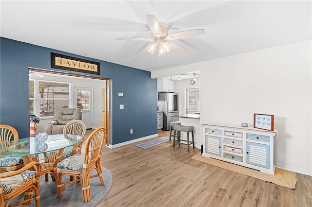 2106 36th Ave, Vero Beach, FL 32960 - dining space featuring light wood-style flooring and ceiling fan
