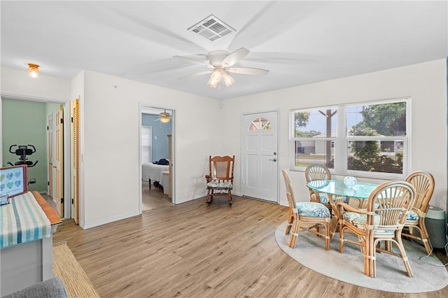 2106 36th Ave, Vero Beach, FL 32960 - dining room with a ceiling fan and light wood finished floors