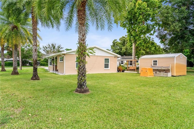 2106 36th Ave, Vero Beach, FL 32960 - view of green lawn featuring an outbuilding