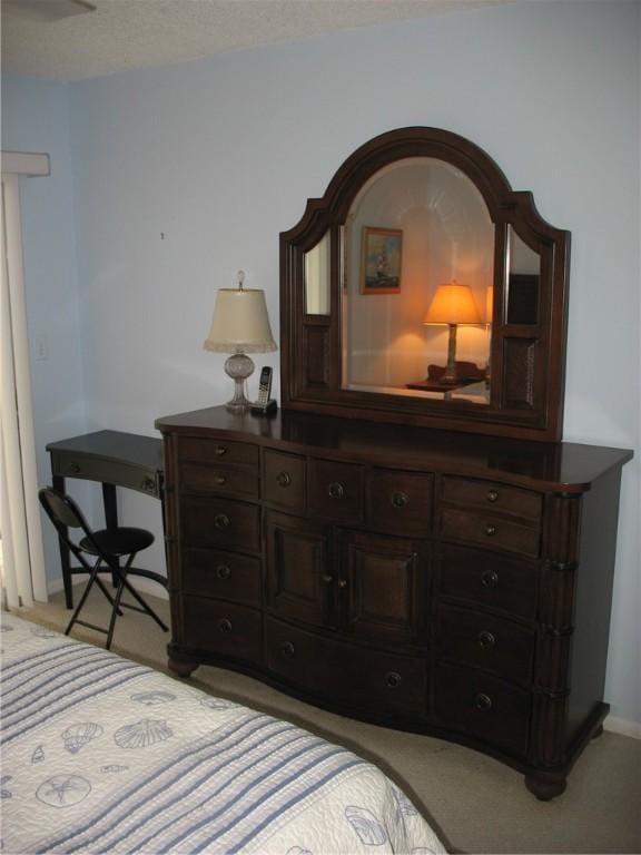 bedroom with light carpet