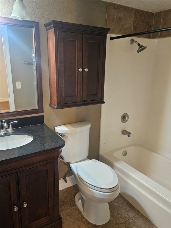 full bathroom with tile patterned floors, vanity, toilet, and shower / bathtub combination