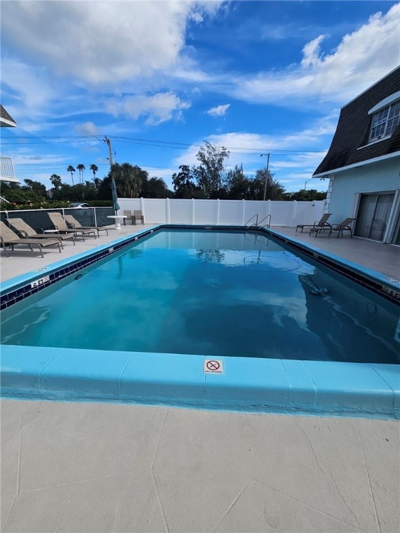 view of pool with a patio