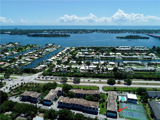 drone / aerial view with a water view