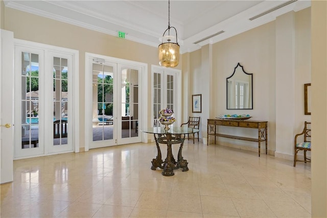 dining area featuring visible vents, french doors, baseboards, and ornamental molding