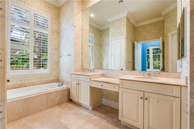 bathroom with a garden tub, a sink, crown molding, wallpapered walls, and double vanity