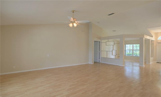 unfurnished living room featuring light wood-style flooring, high vaulted ceiling, visible vents, baseboards, and ceiling fan