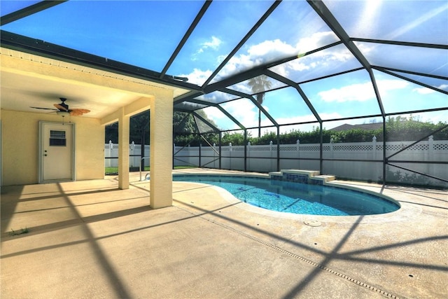 view of pool with a fenced in pool, ceiling fan, a patio area, a fenced backyard, and a lanai