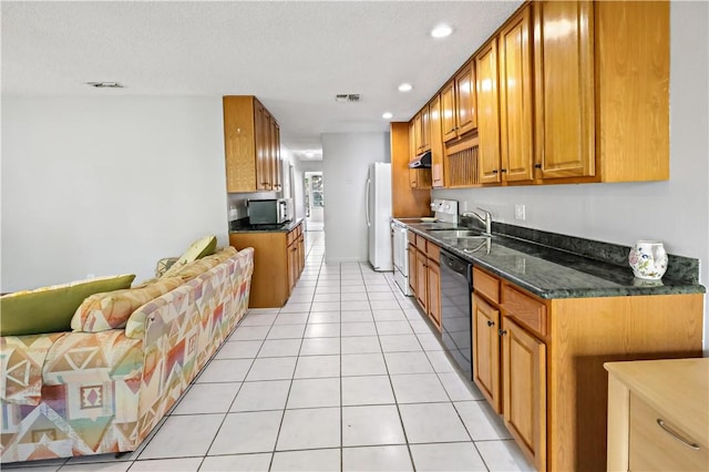 kitchen featuring visible vents, white appliances, recessed lighting, brown cabinets, and light tile patterned floors