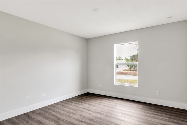 empty room featuring hardwood / wood-style flooring