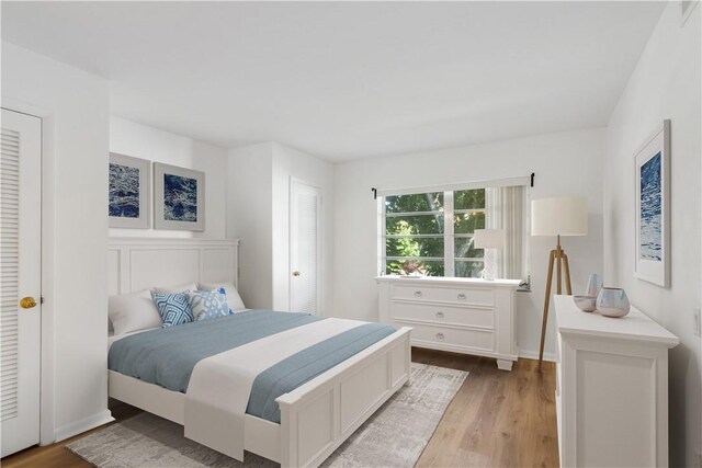 bedroom featuring light hardwood / wood-style flooring