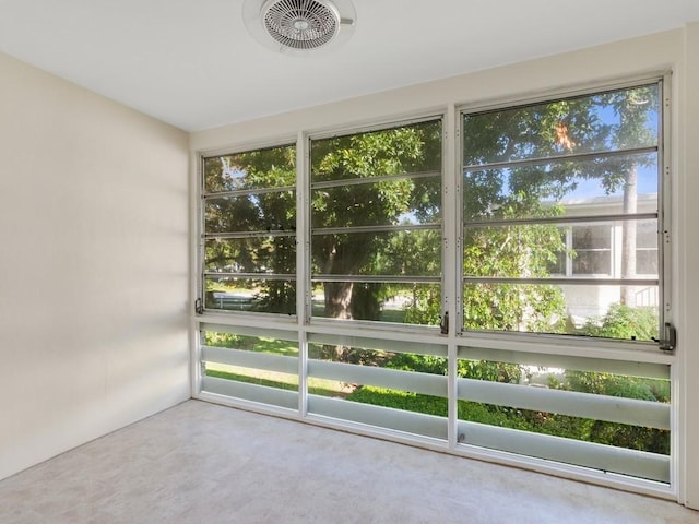 unfurnished sunroom featuring a healthy amount of sunlight