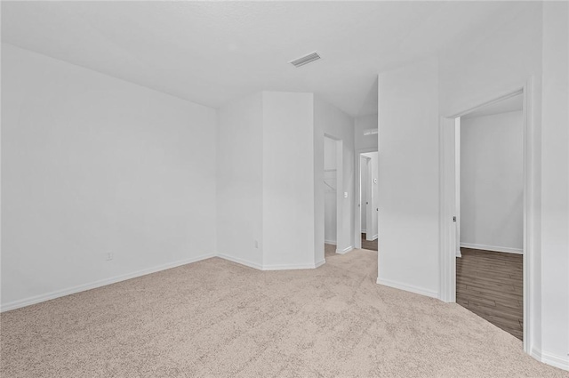 8415 98th Ct, Vero Beach, FL 32967 - carpeted spare room with baseboards