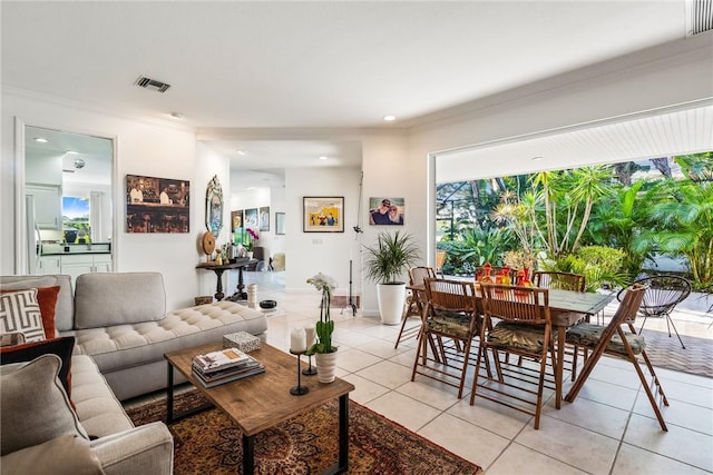 tiled living room with crown molding