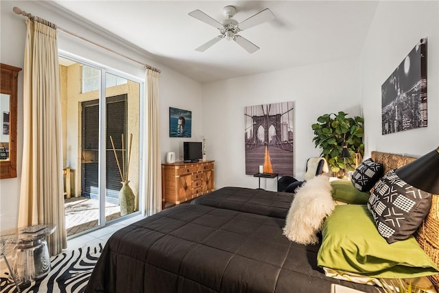 bedroom with ceiling fan, access to outside, and multiple windows