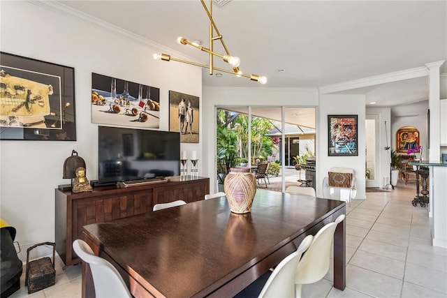 tiled dining space with ornamental molding and a notable chandelier