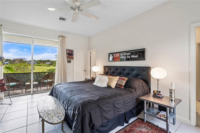 tiled bedroom with access to outside and ceiling fan