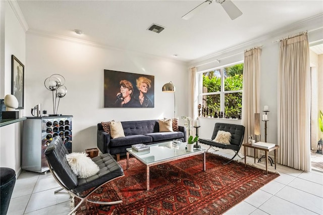 tiled living room featuring crown molding and ceiling fan